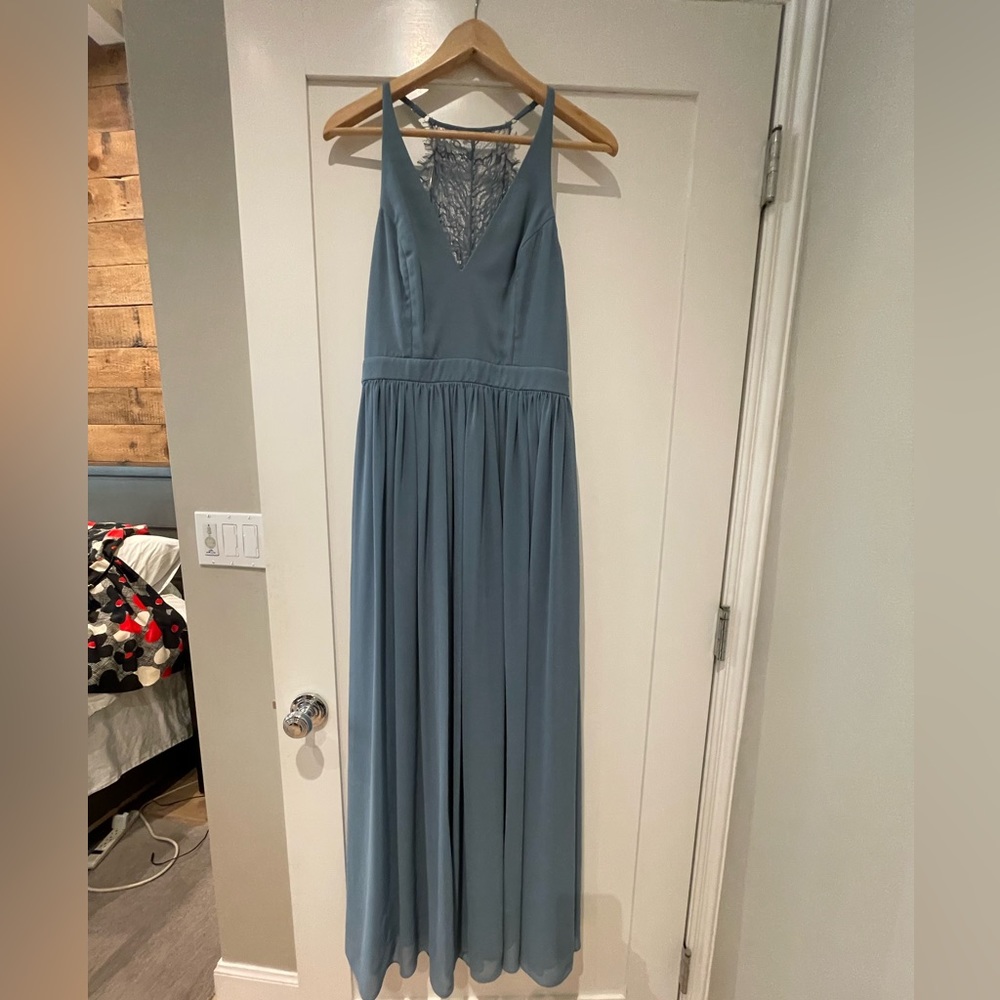 Formal, full length sky blue dress with lace back.